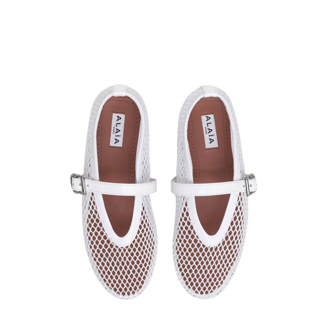 ALAIA BALLET FLATS IN LAMINATED FISHNET white